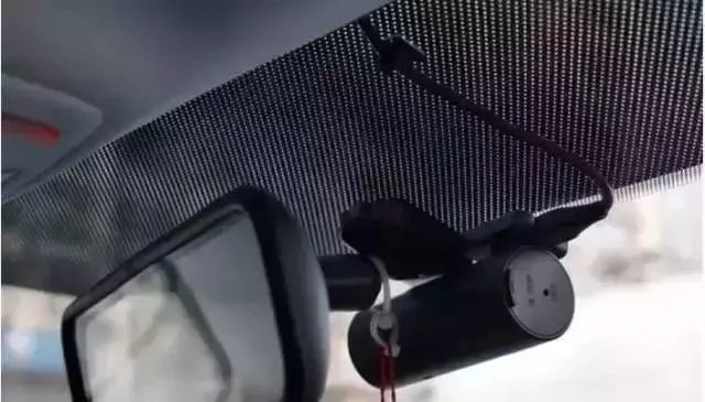 dash cameras are best hidden behind the interior rearview mirror